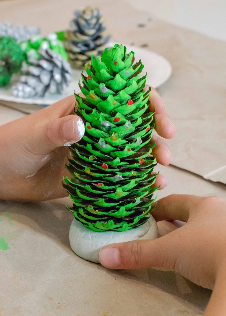 Attach Your Pine Cone to The Clay